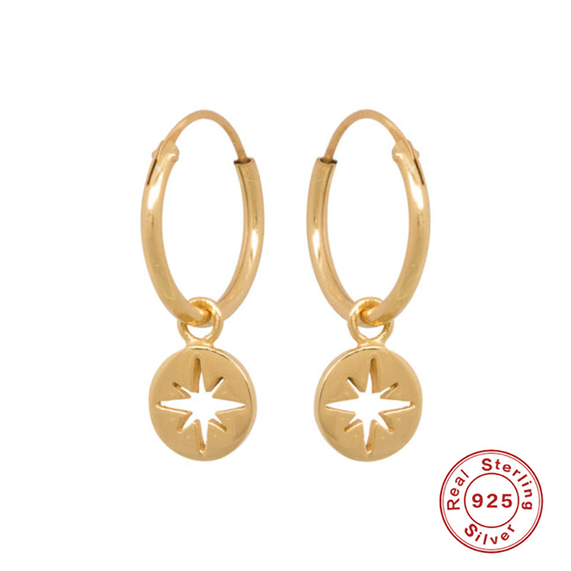 Boucles d'oreilles en forme de pièces de monnaie