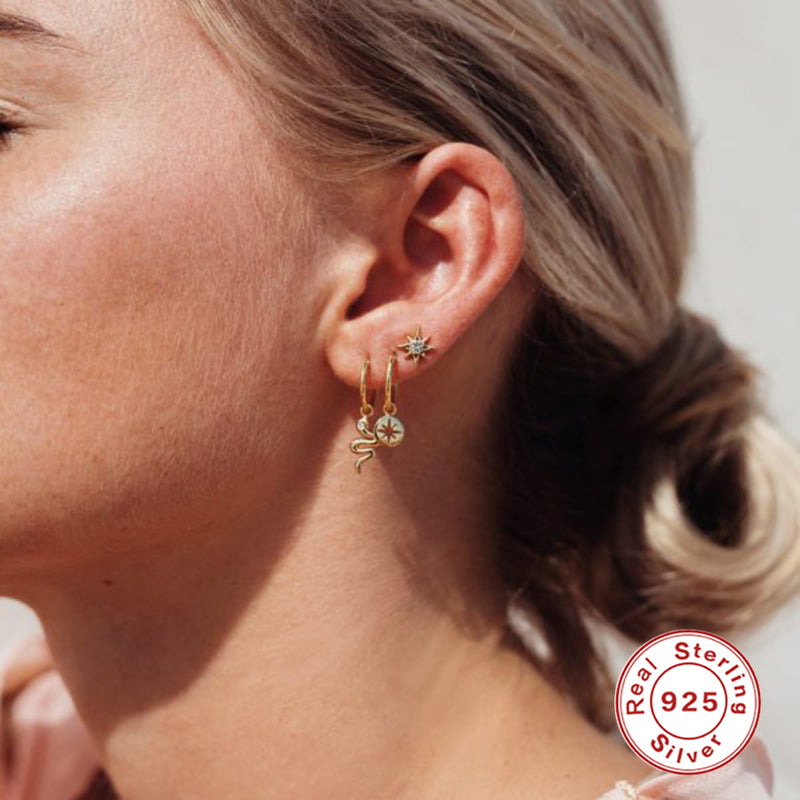 Boucles d'oreilles en forme de pièces de monnaie